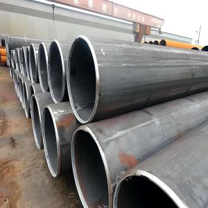 API 5L and ASTM A500 Grade B LSAW carbon steel pipes stored in factory warehouse.